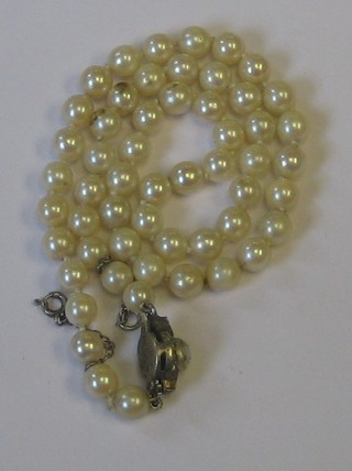 A rope of cultured pearls (clasp f)