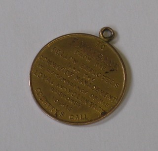 A small gold medal presented to F Millbank from his fellow employees and the Committee of Management in recognition of his loyal and valuable response to his countries call