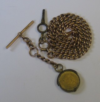 A 9ct gold curb link double Albert watch chain hung a "coin" medallion