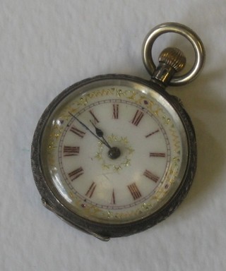 A open faced fob watch contained in a Continental silver engraved case