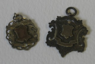 2 silver watch chain medallions