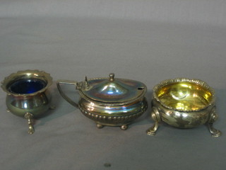 A circular Georgian silver salt, a silver salt and a silver mustard pot