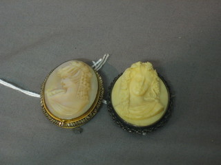 An ivory portrait cameo brooch of a lady and a mother of pearl ditto