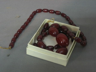 A string of hard stone beads
