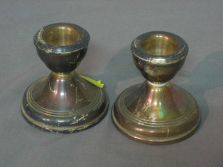 A pair of silver stub candlesticks, Birmingham 1921 2"