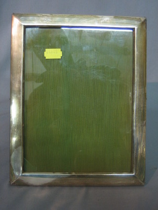 A plain silver easel photograph frame Birmingham 1925 9 1/2" x 7 1/2"