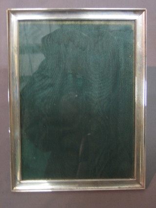 A plain silver easel photograph frame 8" x 6"