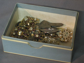 A collection of various items of costume jewellery