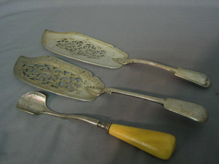 A pair of 19th Century pierced silver plated fiddle pattern fish slices and a silver plated stilton scoop