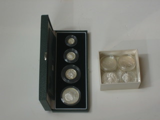 A 4 coin silver proof set of the Britannia Collection, together with 6 silver crowns
