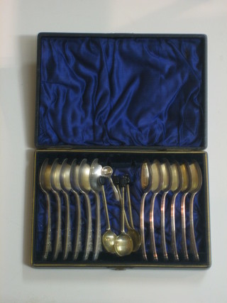 A set of 12 silver plated tea spoons with engraved decoration and 4 bean end coffee spoons 