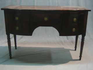 A Georgian mahogany bow front sideboard fitted 1 long drawer flanked by cupboards, raised on turned supports 48"