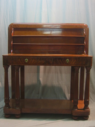 A 19th Century flame mahogany buffet with hinged lid, the base fitted 2 shelves, the base fitted 2 cupboards, raised on turned supports with undertier, 54"