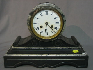 A 19th Century French 8 day striking mantel clock with enamelled dial and Roman numerals contained in a 2 colour marble drum case with scroll decoration (slight chip to side)