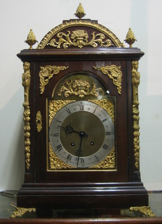 A handsome Georgian mahogany clock case with gilt metal mounts throughout, containing an Edwardian striking bracket clock 24" overall