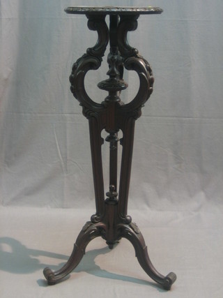 An Edwardian circular mahogany jardiniere stand, raised on pierced tripod and cabriole supports 13"