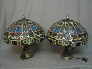 A pair of Liberty style bronze table lamps with lead glazed shades 16"
