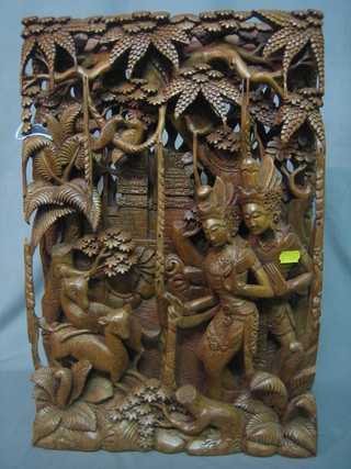An Eastern carved and pierced panel 19" x 13"