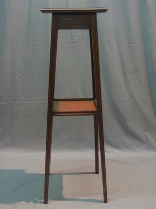 An Edwardian square inlaid mahogany 2 tier jardiniere stand raised on square tapering supports 13"