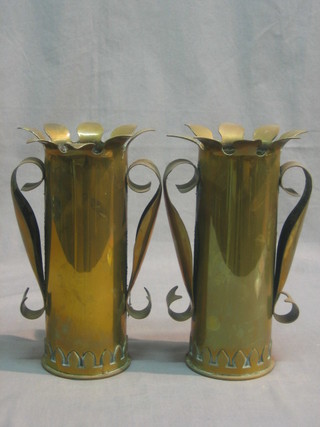 A pair of twin handled Trench Art vases formed from shells