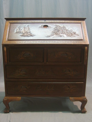 A 1920's carved camphor bureau with fall front, above 2 long and 2 short drawers, raised on cabriole supports 36"