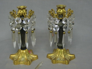 A pair of gilt metal and ormolu lustres 9 1/2"