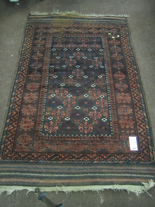A Belouch rug (some wear) 73" x 43"