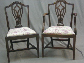 A set of 3 19th Century Hepplewhite style camel back dining chairs with pierced vase shaped backs - 1 carver, 2 standard together with a similar 19th Century mahogany Hepplewhite style camel back dining chair (4) 