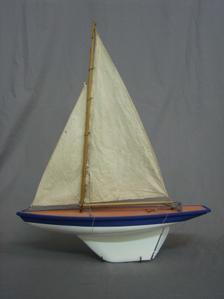 A wooden pond yacht