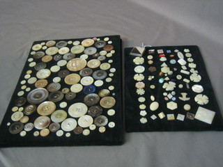 A collection of mother of pearl and other buttons