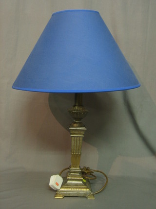 A square metal table lamp with fluted decoration, raised on a square base 16"