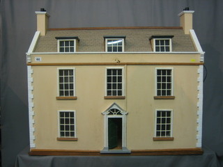 A wooden dolls house 36"