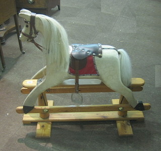 A 20th Century painted wooden rocking horse 29"