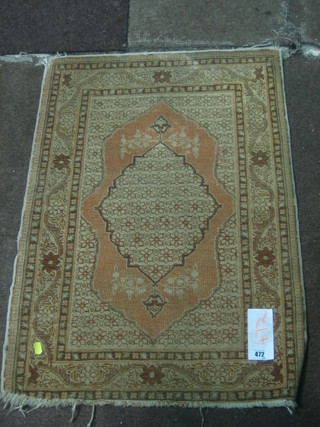 A white ground Persian slip rug with central medallion 33" x 23 1/2"