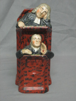 A Staffordshire figure in the form of The Vicar and Moses, 10"