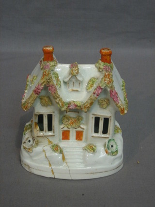 A Staffordshire pastel burner in the form of a cottage 4" (f and r)