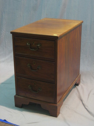 A mahogany pedestal chest of 3 long drawers, raised on bracket feet 15"