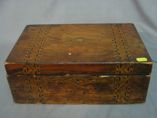 A Victorian walnut writing slope with hinged lid and inlaid decoration 14"