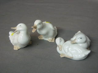 A Nao figure group of 2 curled seated ducks 4" and 2 other Nao figures of ducks (3)