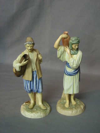 A pair of Worcester "The Hadley Collection" figures, modelled by James Hadley - Eastern Water Carriers, 8", base with black Worcester mark