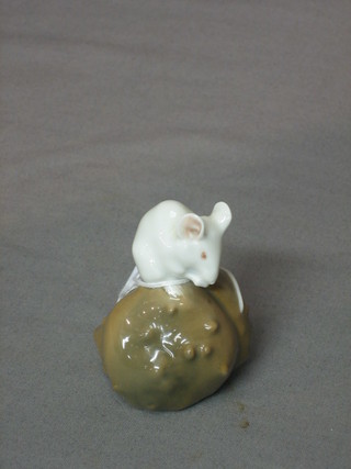 A Royal Copenhagen figure of a seated mouse, base marked 511 2 1/2"