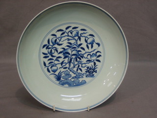 An Oriental circular blue and white porcelain dish, base with 6 character mark 9"