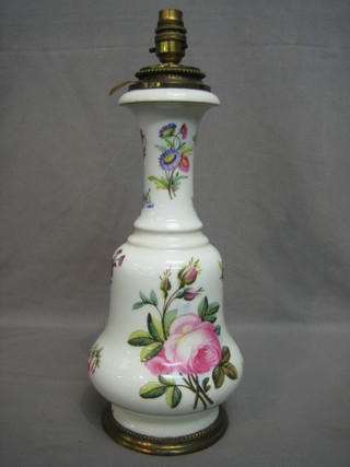 A Victorian opaque glass vase converted to an electric table lamp with floral decoration and gilt metal mounts 14"