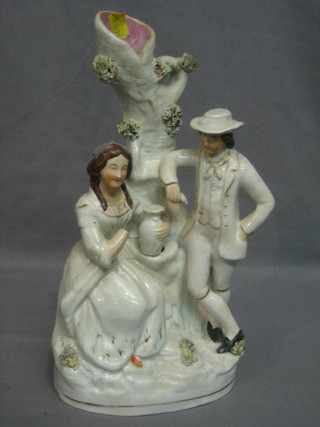 A 19th Century Staffordshire arbour group in the form of a standing couple 12"