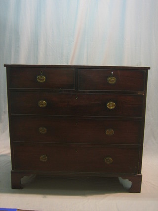 A 19th Century mahogany chest of 2 short and 3 long drawers, raised on bracket feet 42"