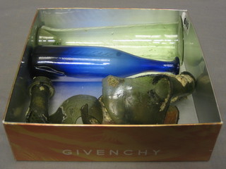 An Antique blown glass vase 3", a do. blue bottle 7 1/2" and an Antique broken wine bottle