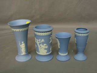 A Wedgwood blue Jasperware trumpet shaped vase 6", 3 other small vases and a jar and cover