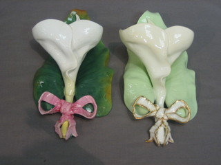 A pair of Victorian pottery wall pockets in the form of flowers (1f), 11"