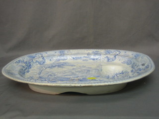 A 19th Century blue and white meat plate, the reverse marked Italian scenery 19"