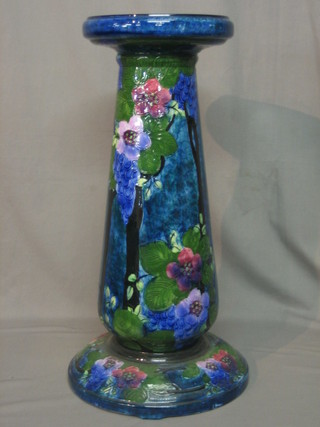 A Moorcroft style pottery jardiniere stand with blue glaze and floral decoration 25"